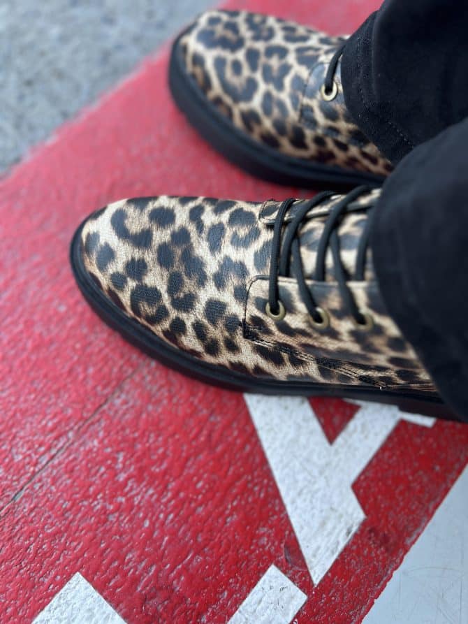 Boot Up For Race Day With Claudia Ghizzani Black Combat Biker Boot Leopard