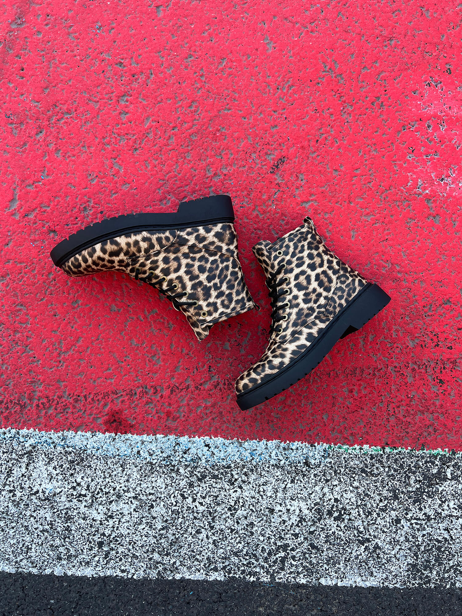 Boot Up For Race Day With Claudia Ghizzani Black Combat Biker Boot Leopard